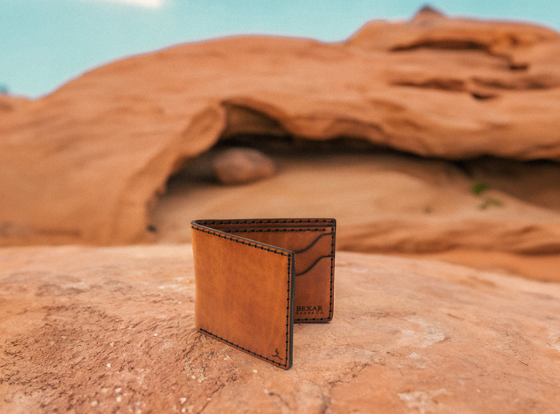 brown leather four pocket bifold with cash sleeve