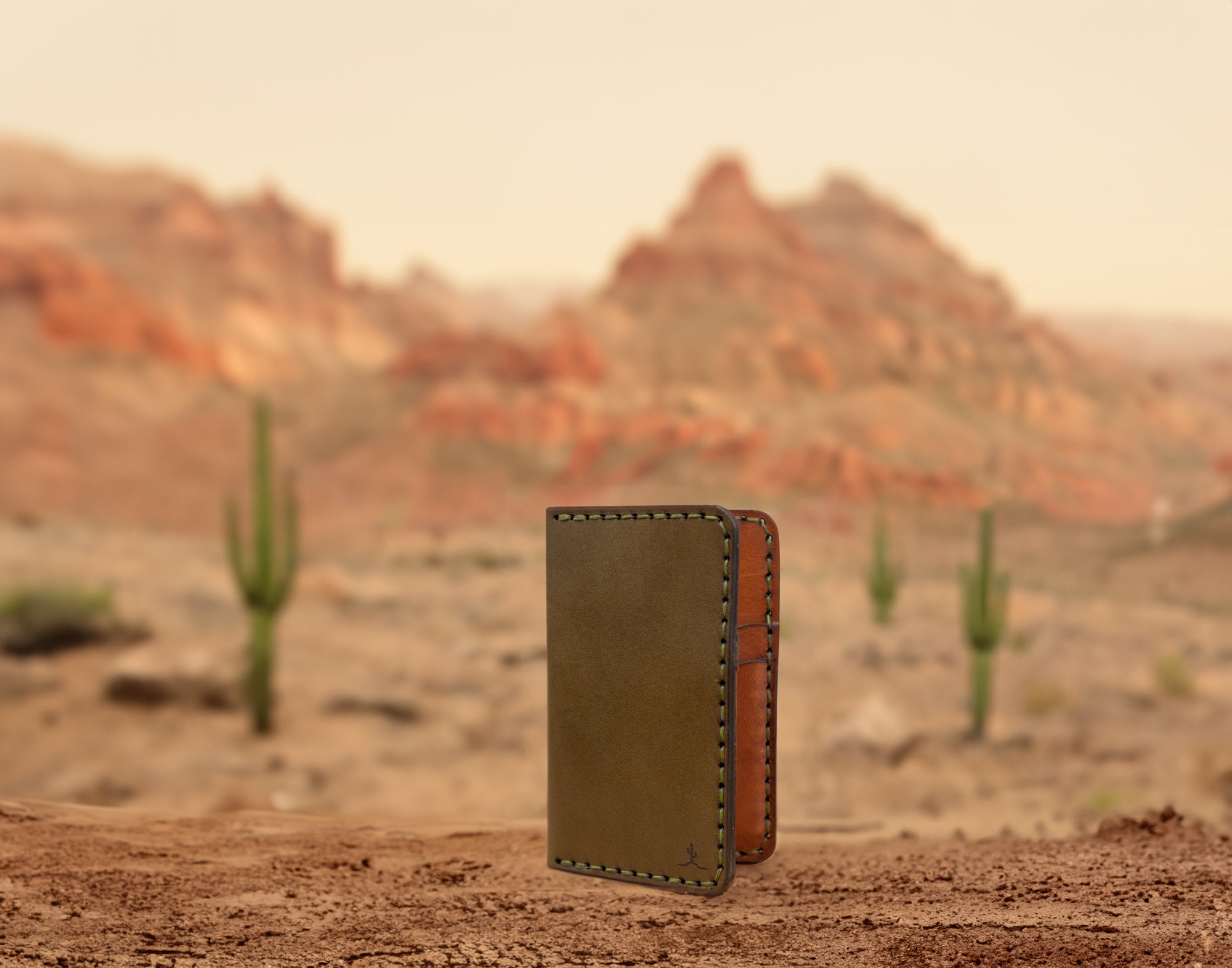 green and brown leather four card vertical wallet