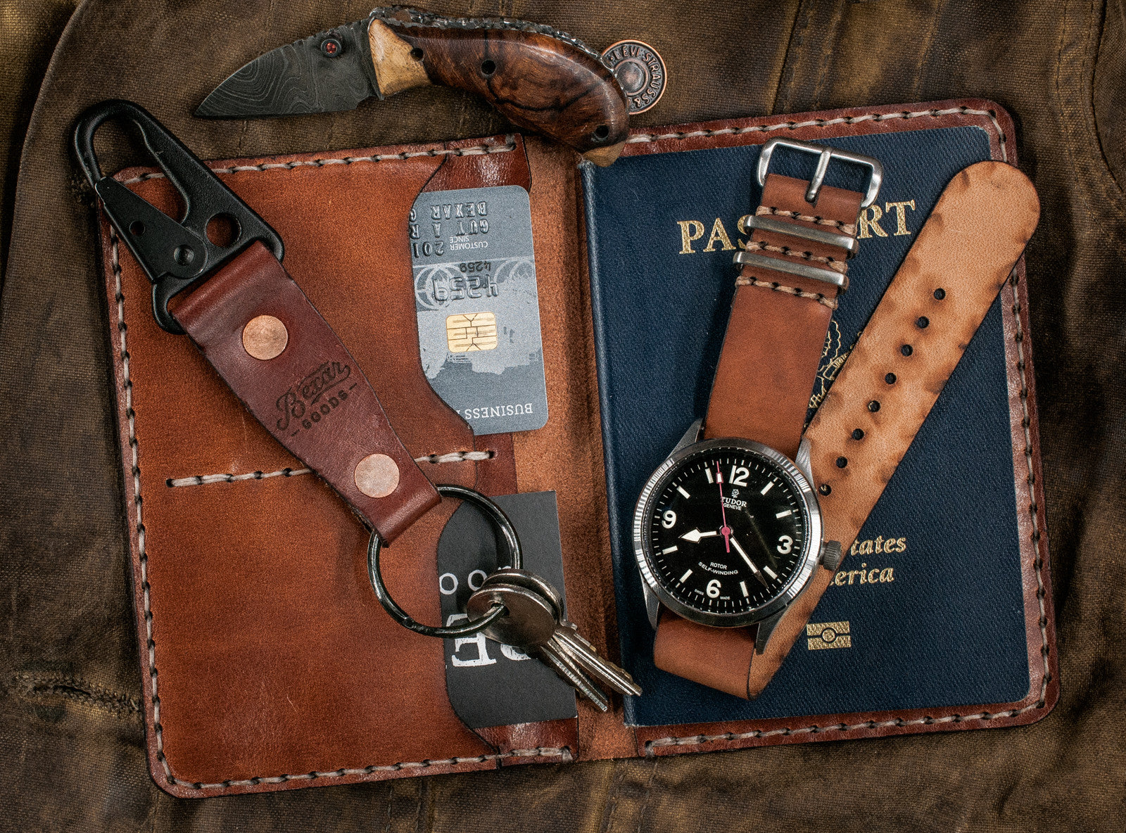 brown leather passport wallet with two card pockets and internal sleeve